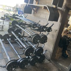 2    New 7k Trailer Axels With brakes