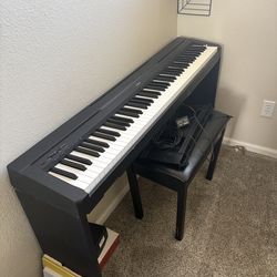 Digital piano with stand and bench