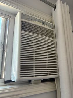 Two Fridgedaire  10,000 BTU 115-Volt Room Window Air Conditioner with Full-Function Remote Control