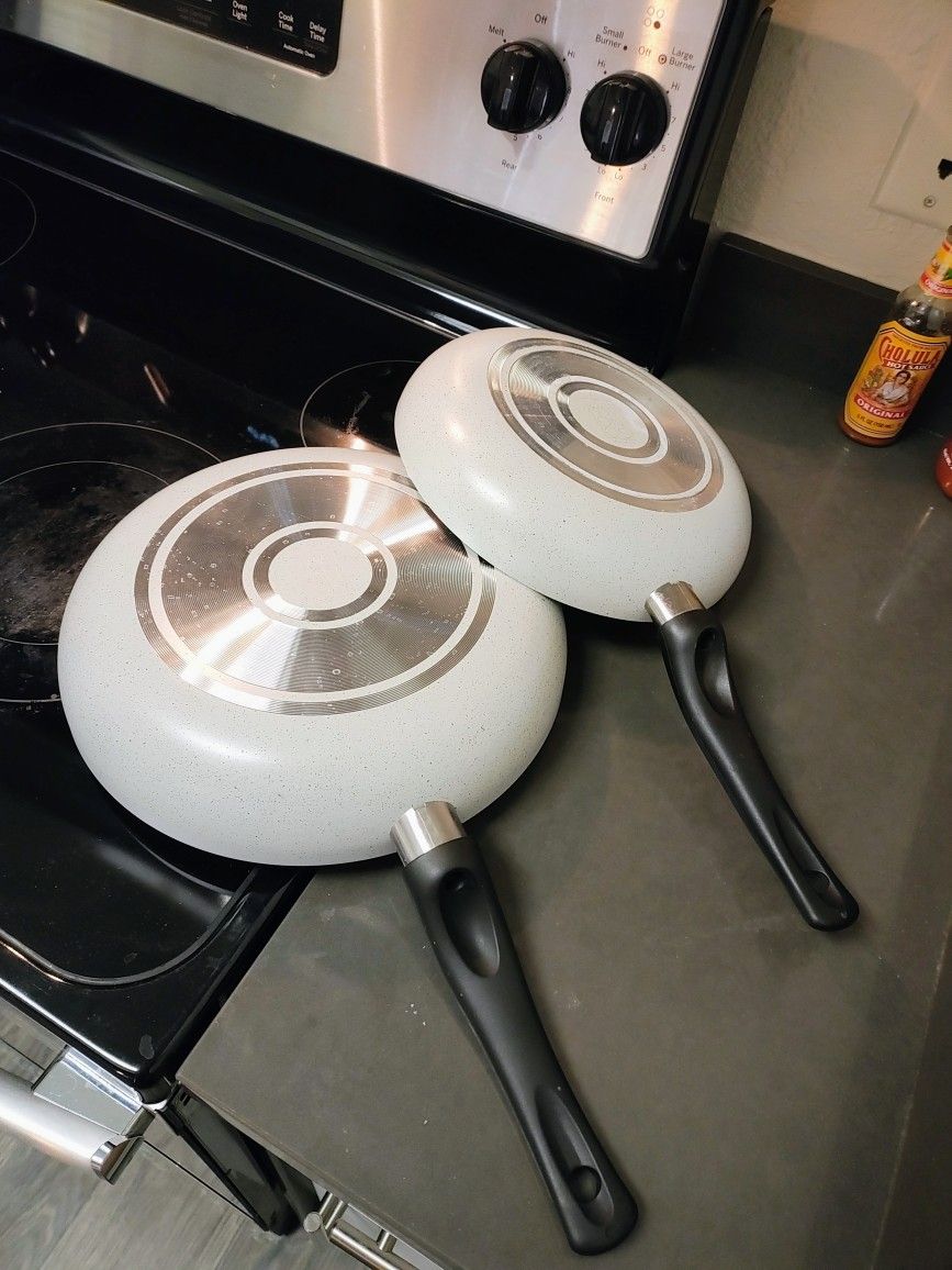 Grey Frying Pans..Large One New.. Smaller One .Used