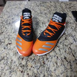 Adidas Icon V Boost metal cleats. Black and orange mens size 12