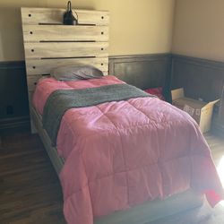 Ashley’s Home Store Twin Bed. 
