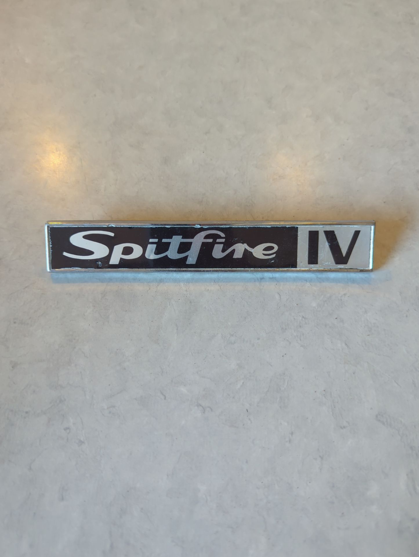 Vintage triumph spitfire mk IV boot badge