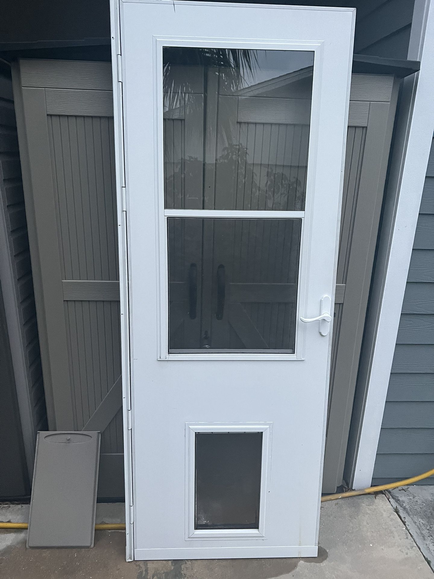 Storm Door With Dog Door