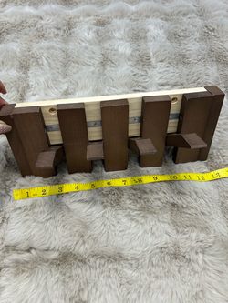 Piano style rack for keys an coats
