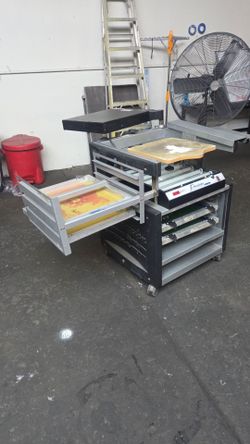 Press-A-Print Precision Screen Printing System, designed as an all-in-one workstation for garment printing.