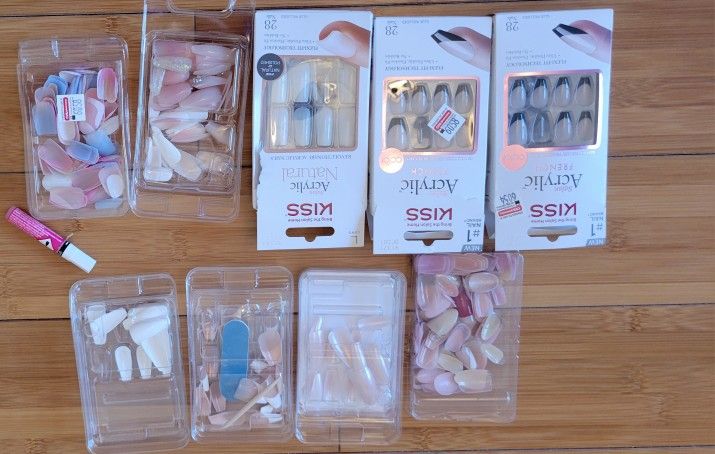 Nails Kiss Acrylic and hair twist rollers and 3 makeup bags. All $7