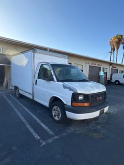 White GMC box truck 2005