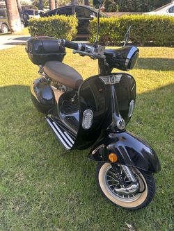 Electric Vespa Style Scooter