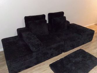 Black boneless couch.