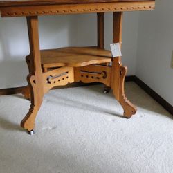 Vintage Light Oak Table With Shelf And Porcelain Casters