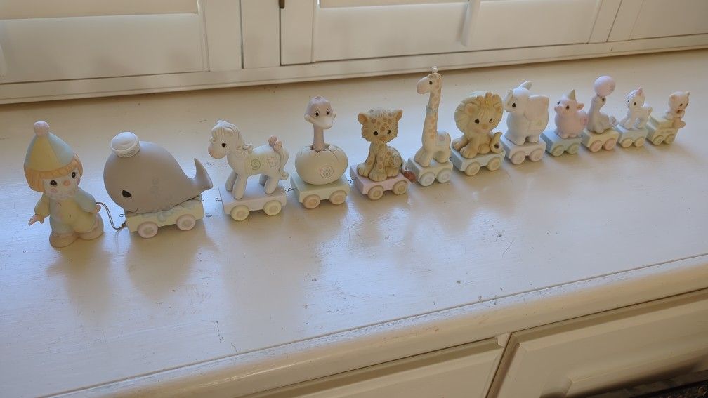 Precious Moments animal birthday train set (12 porcelain figurines)