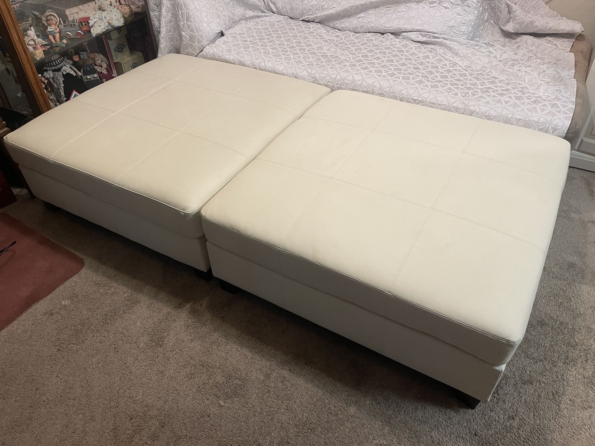 White Leather Polyurethane Large Ottoman 39” x 39”  Pair Was $1025 New Bought in 2023, so only a year and a few months old. In very good condition.