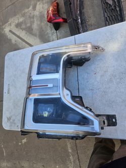 Ford f250 right headlight lid Oem