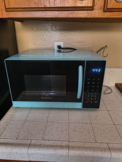 Frigidaire light blue microwave - pickup Sept 28