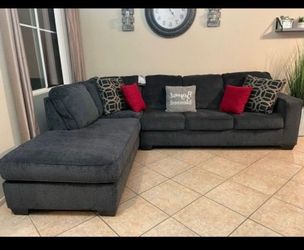 Beautiful charcoal grey sectional couch from Ashley furniture