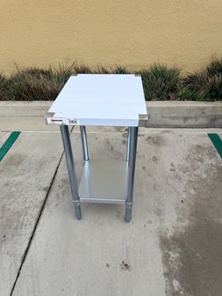 Work table 18” x 24” stainless steel top galvanized legs and undershelf