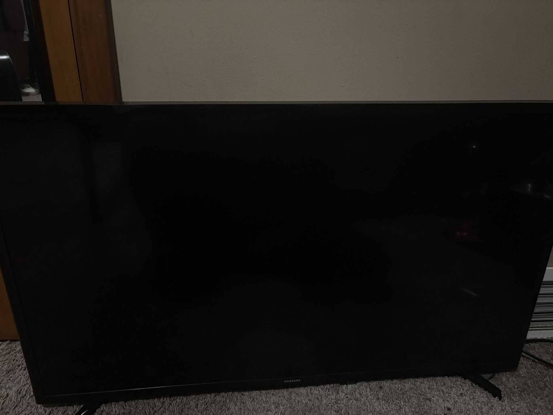 Black 40’ inch Samsung Tv.