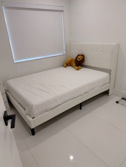 Full size white leather bed