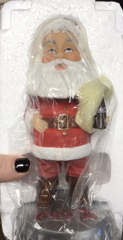 2002 Coca-Cola Santa on bottle cap from Carl’s Jr.