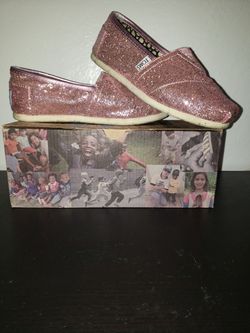 Pink glitter Tom's slip ons