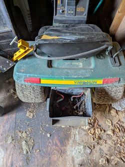 two older riding lawn mowers I believe they thay can start+extras