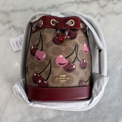 Coach Mini Bucket Bag In Signature Canvas With Cherry Print