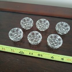 six vintage pressed glass salt cellars, also known as salt dips