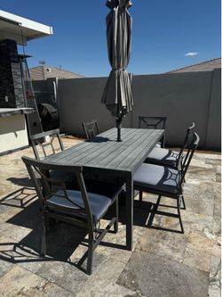Outdoor patio table and chairs set