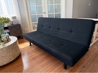 Black futon sofa, used