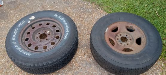 Ford 6 lug rim & Tire,  chevy 6 lug rim and tire $25.00 each