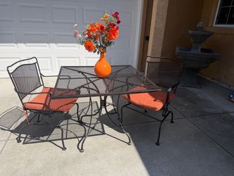 Super cute patio set with chairs that rock