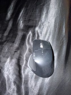 Logitech MX Master 4 wireless mouse features a dark gray finish and MagSpeed scrolling