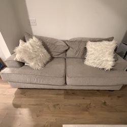 Cozy Beige Sofa w/ Pillows – Great Condition