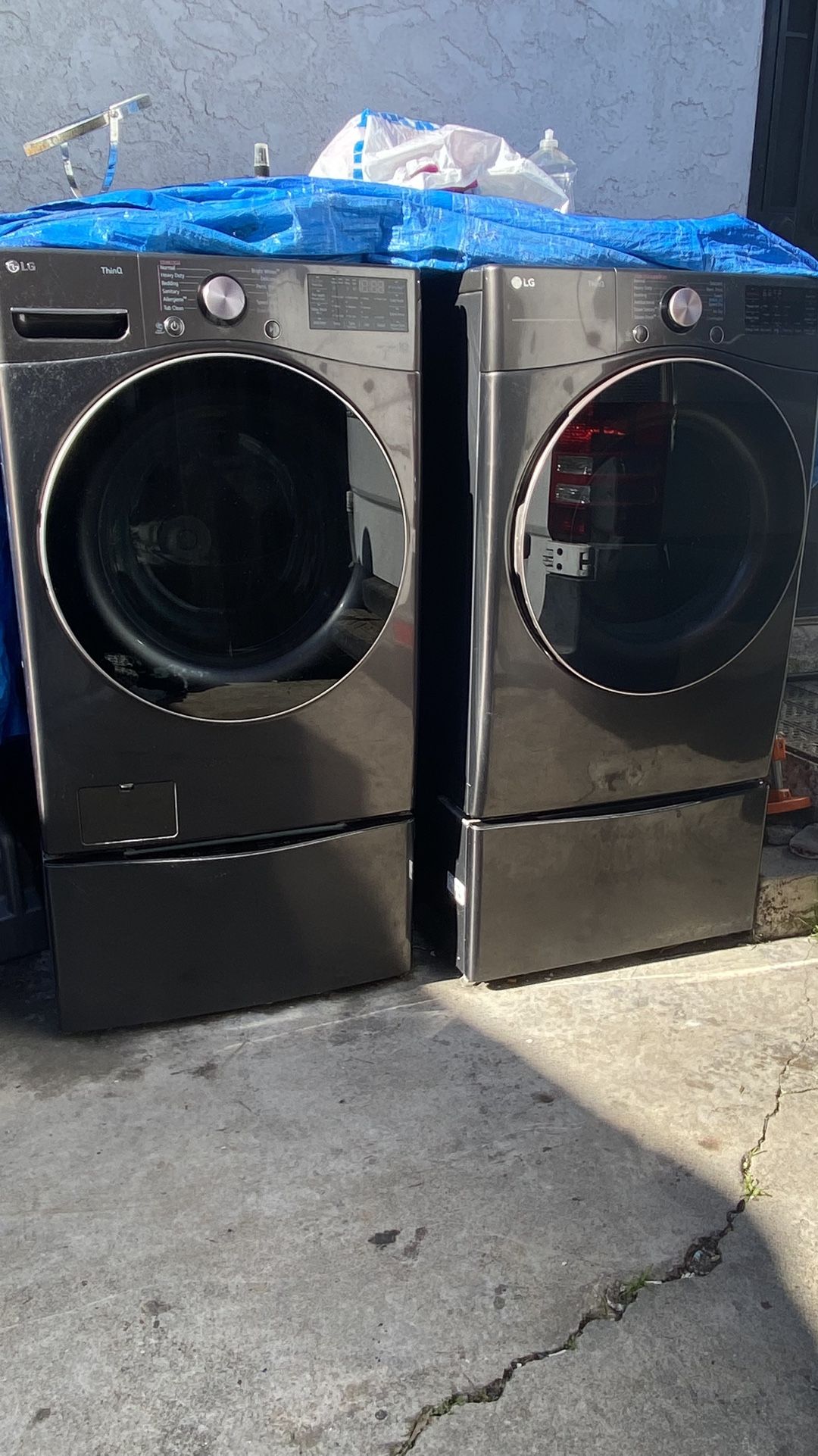 LG WASHER WITH SMALL PEDESTAL WASHER & DRYER WITH SMALL STORAGE PEDESTAL
