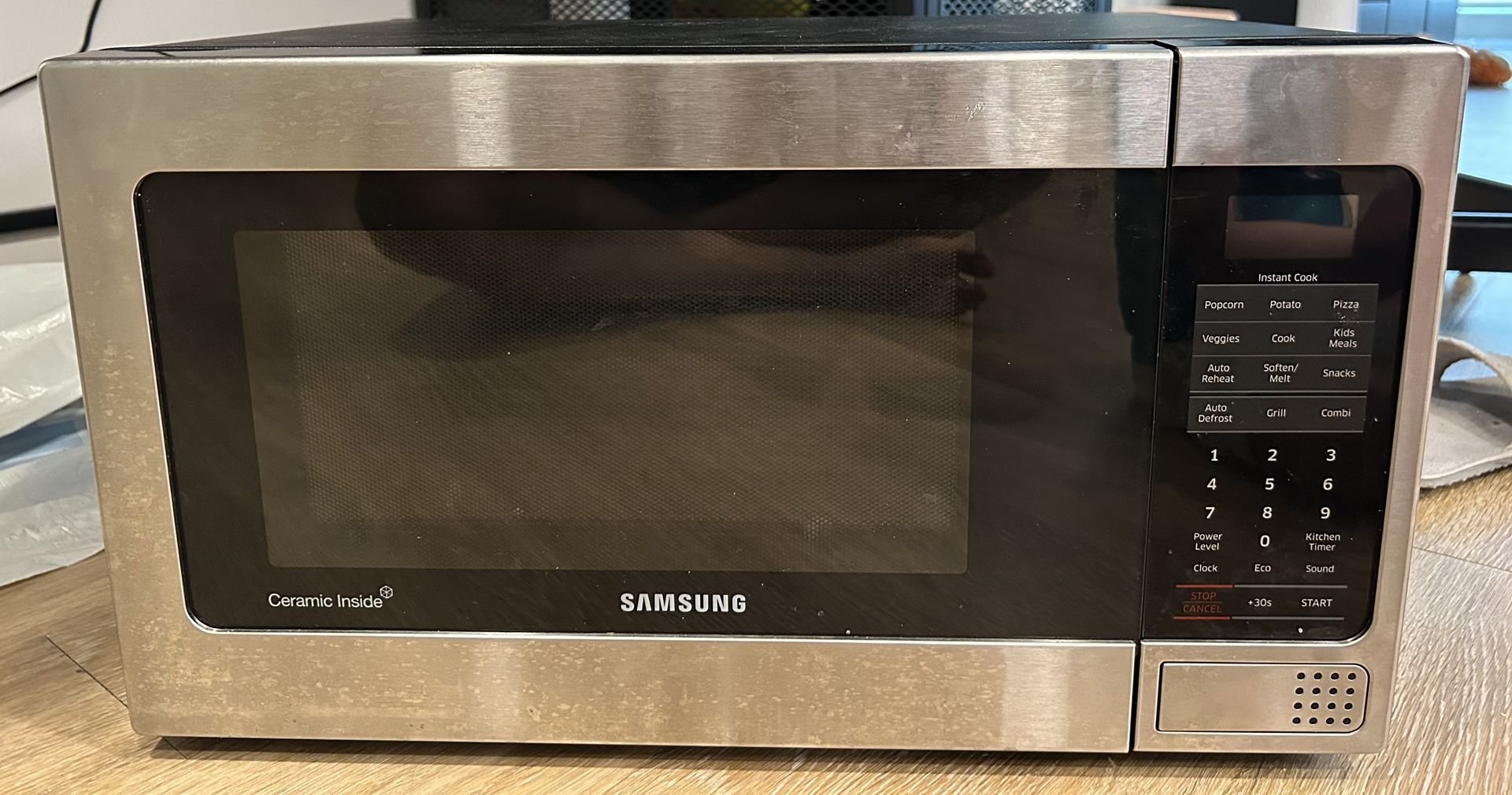 1.1 cu. ft Countertop Microwave with Grilling Element in Stainless Steel