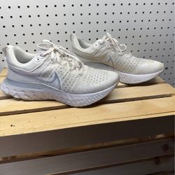 Nike React Infinity Run Flyknit 2 running shoes in white with silver accents.  Women’s shoes!