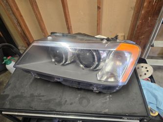 2011-2014 BMW X3 driver side headlight