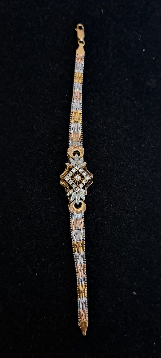 Sterling Silver Bracelet Accented With 2 Tones Of Gold, Made In Italy,7"