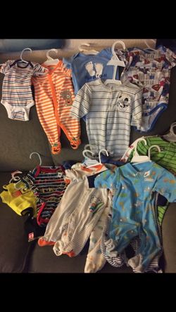 Lot of newborn to 3-6 month boys sleepers, onesies etc