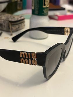 MIU MIU black sunglasses