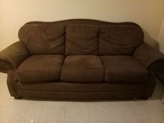 Brown suede three cushion couch
