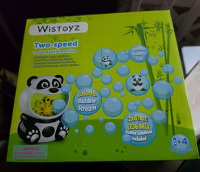 Brand new adorable panda bubble machine with bubble solution included!