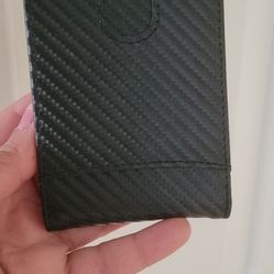 2 mens wallet both $10.. first one new never used 