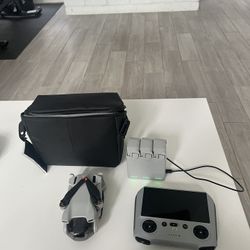 DJI Mini 3 Camera Drone (with RC Remote) 3 Batteries