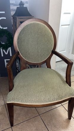 2x green wooden chairs