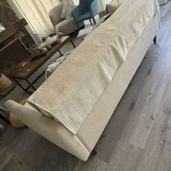 The sofa comes with 3 throw pillows, all for 50 USD