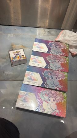 Pokemon 2 prismatic UPCs and surging spark booster box