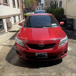 Red 2009 Toyota Corolla  Sedan 