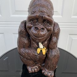 Ape with banana statue